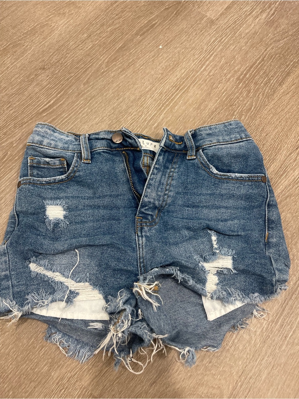 High-Rise Distressed Blue Denim Shorts